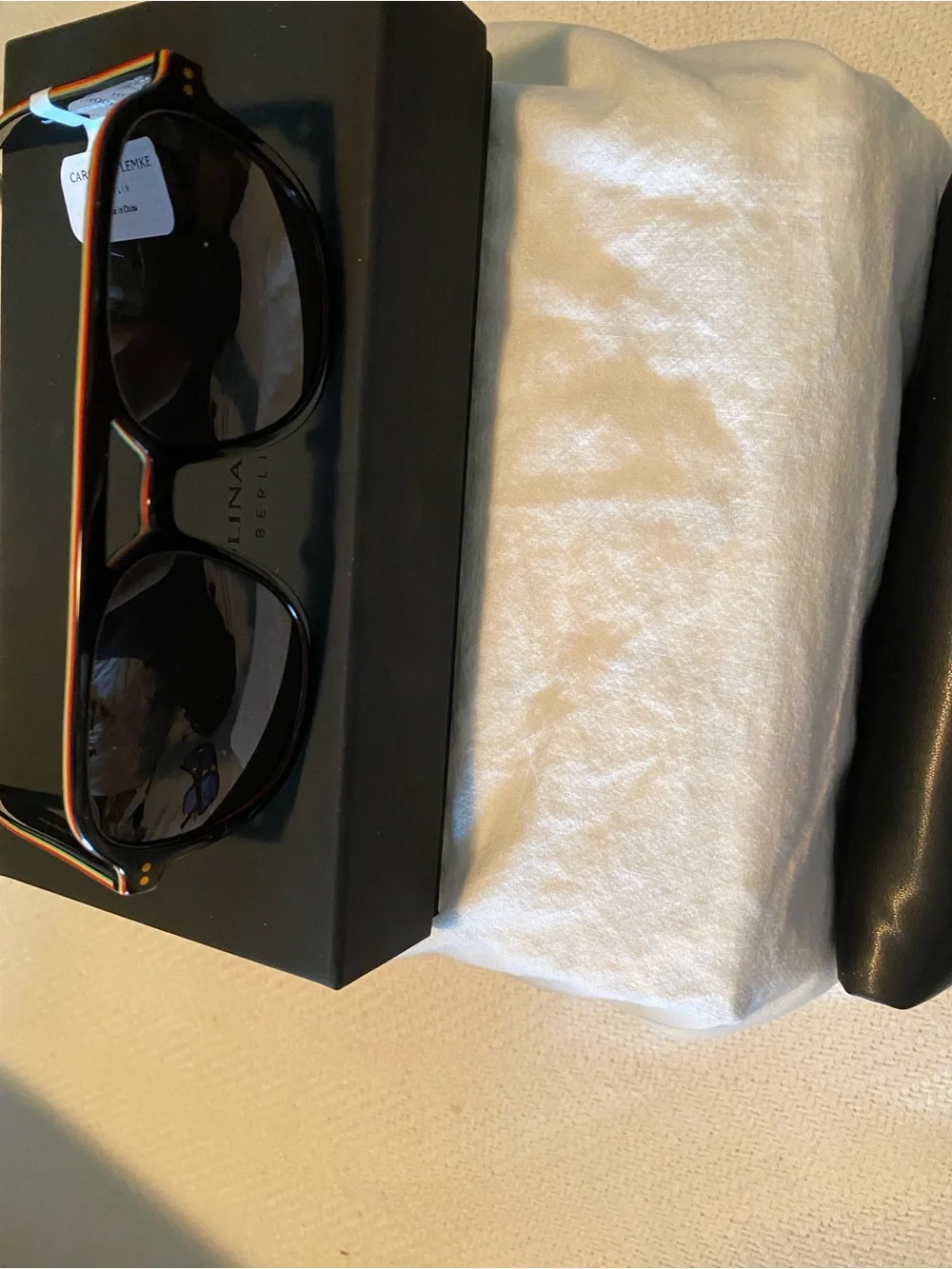 Carolina Lemke Men’s Black Aviator-Style Sunglasses with Rasta colored edges